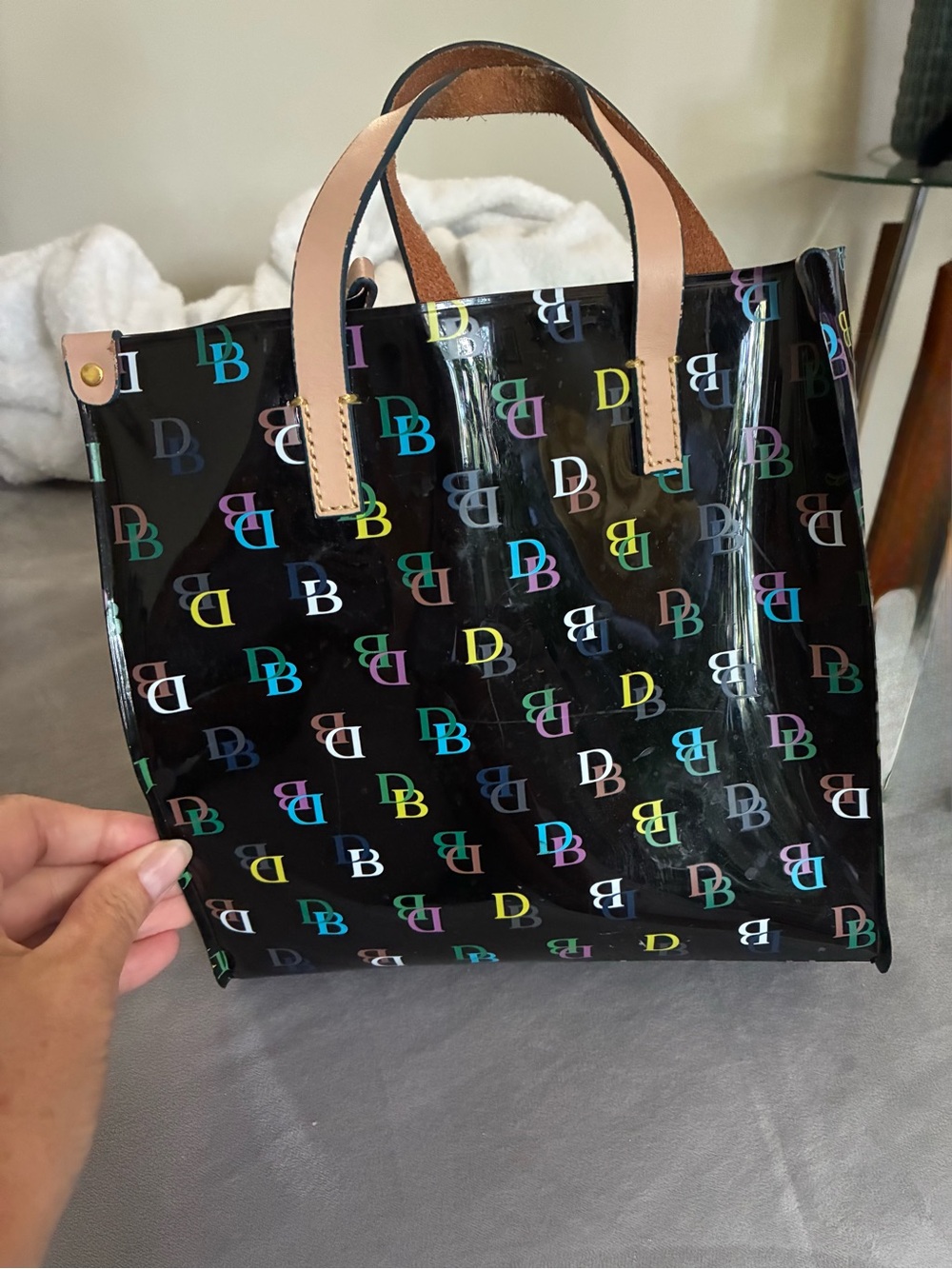 Dooney & Bourke Black Glossy Tote with Multicolor DB Logos and Tan Handles - Picture 2 of 3